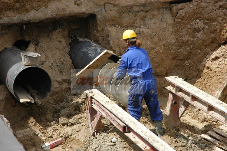 Industrielle Fotos über Arbeiten an der Infrastruktur